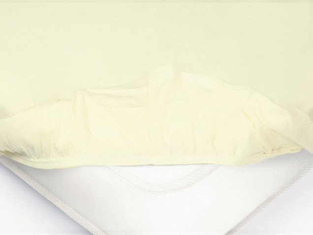 Простыня на резинке Нежно-желтая трикотажная в кроватку Ecotex